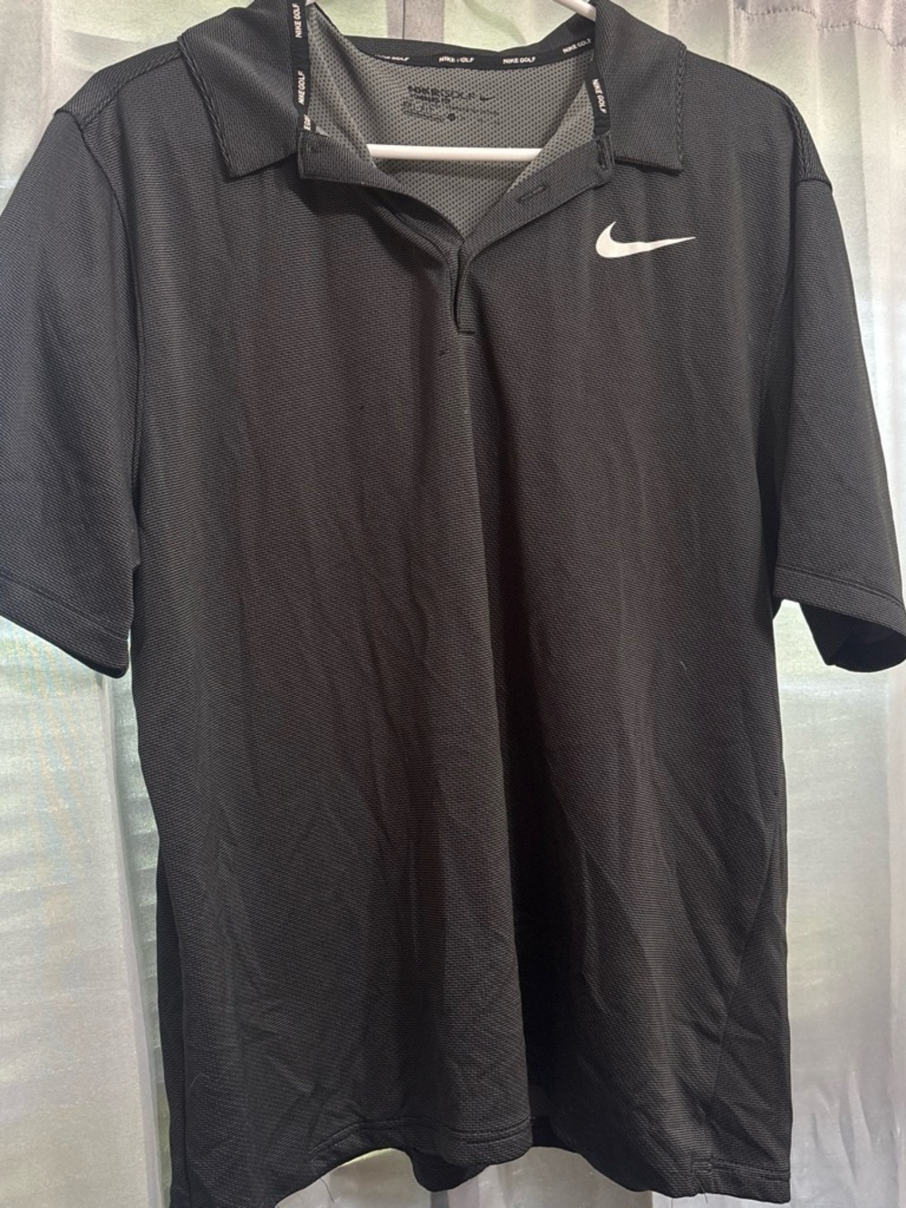 Nike Men’s Black Polo with White Swoosh